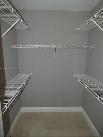 a view of a room with racks on the wall