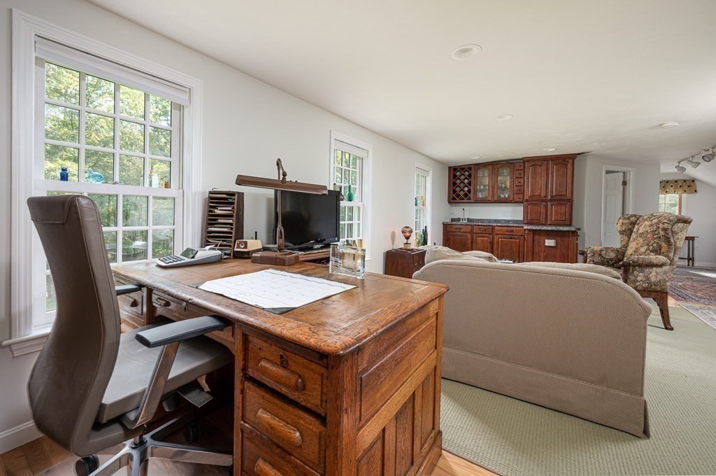 215 Stafford Road Holland, MA 01521 - Photo 26 of 36 a living room with furniture and large windows