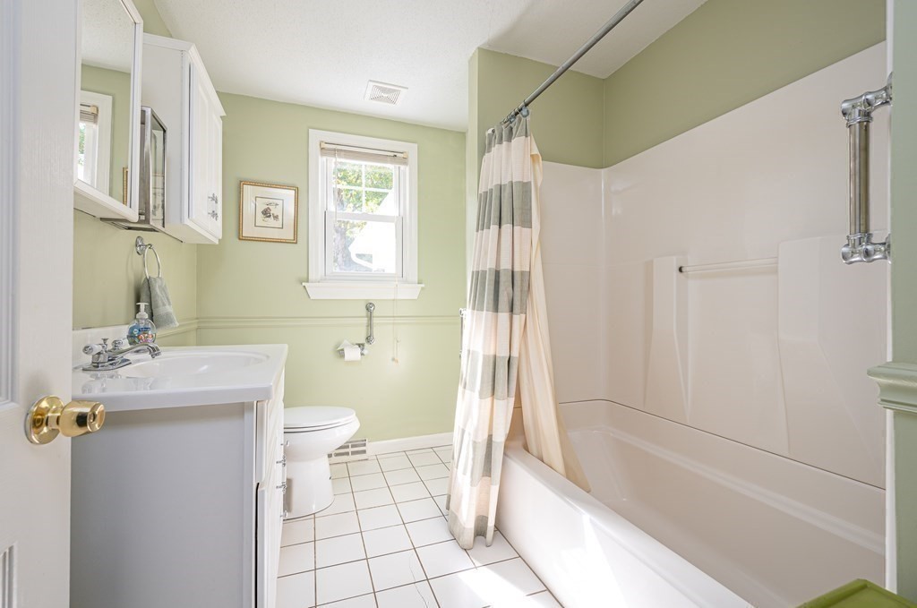 215 Stafford Road Holland, MA 01521 - Photo 27 of 36 a bathroom with a granite countertop sink toilet and shower