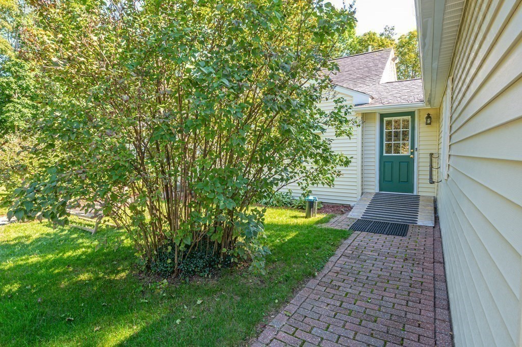 215 Stafford Road Holland, MA 01521 - Photo 3 of 36 a view of a pathway both side of a house