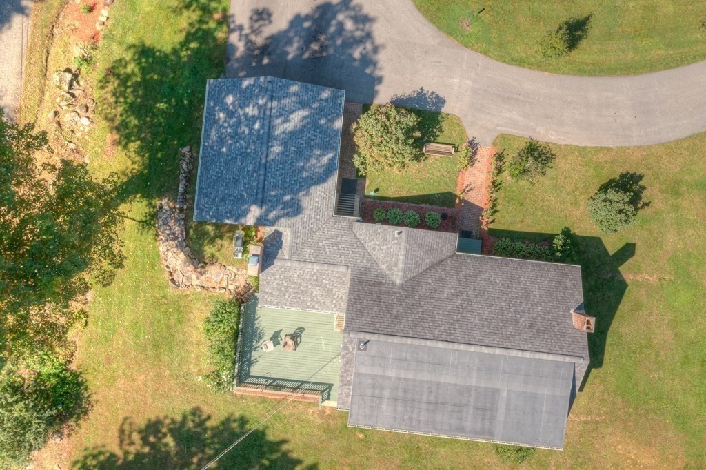 215 Stafford Road Holland, MA 01521 - Photo 6 of 36 an aerial view of a house with a swimming pool