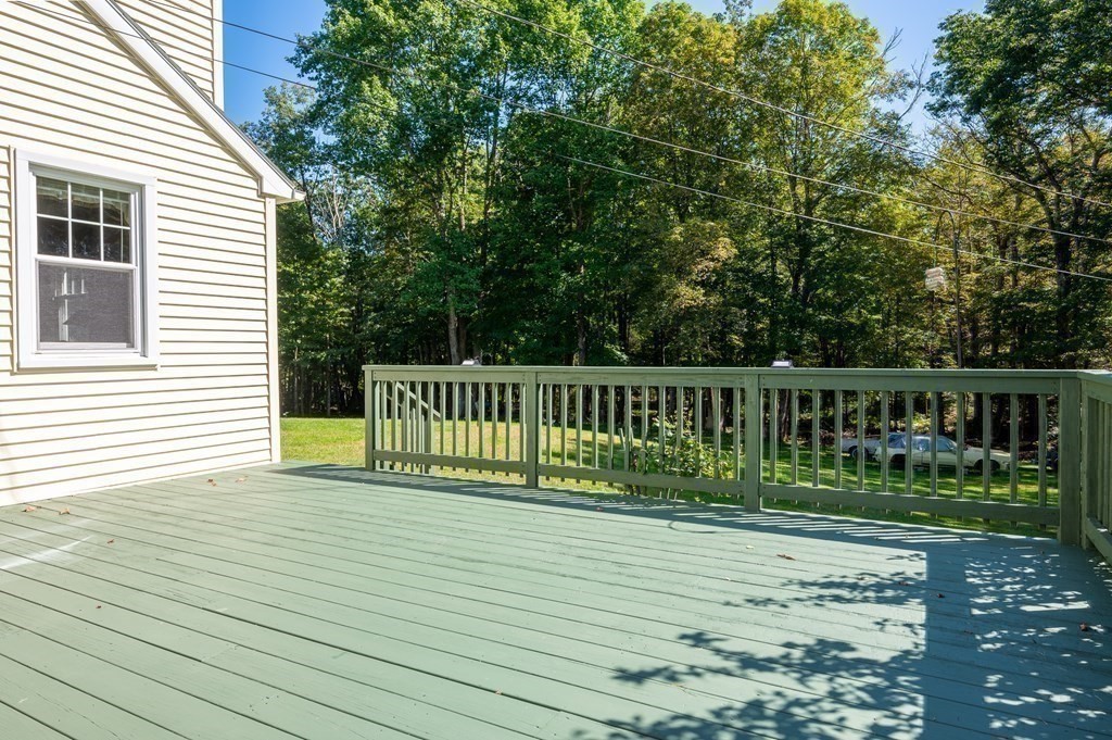 215 Stafford Road Holland, MA 01521 - Photo 10 of 36 a view of a house with wooden fence