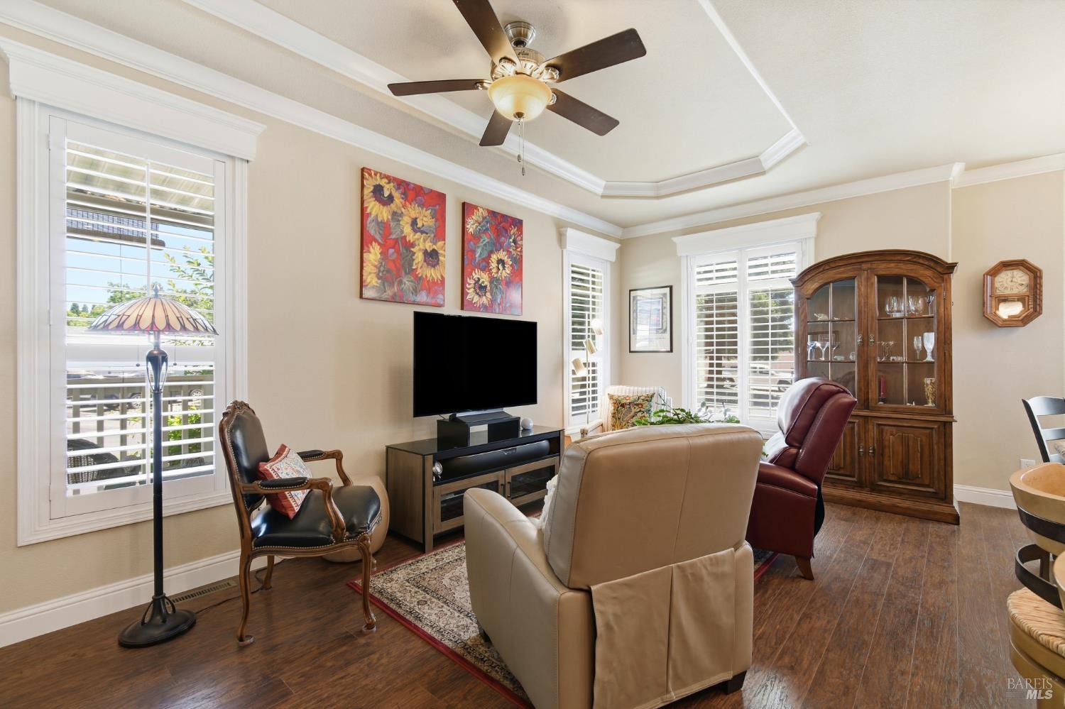120 Shamrock Circle Santa Rosa, CA 95403 - Photo 12 of 45 a living room with furniture a flat screen tv and wooden floor