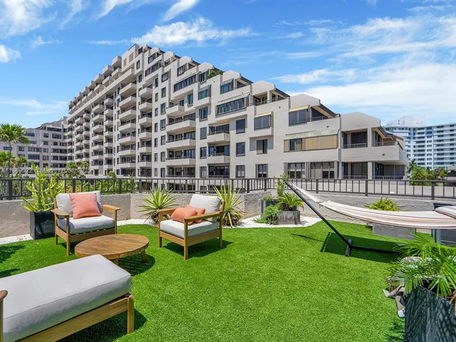 a building outdoor space with patio furniture