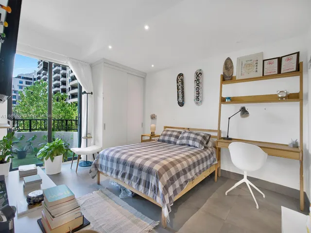 a bathroom with a sink mirror toilet and bathtub
