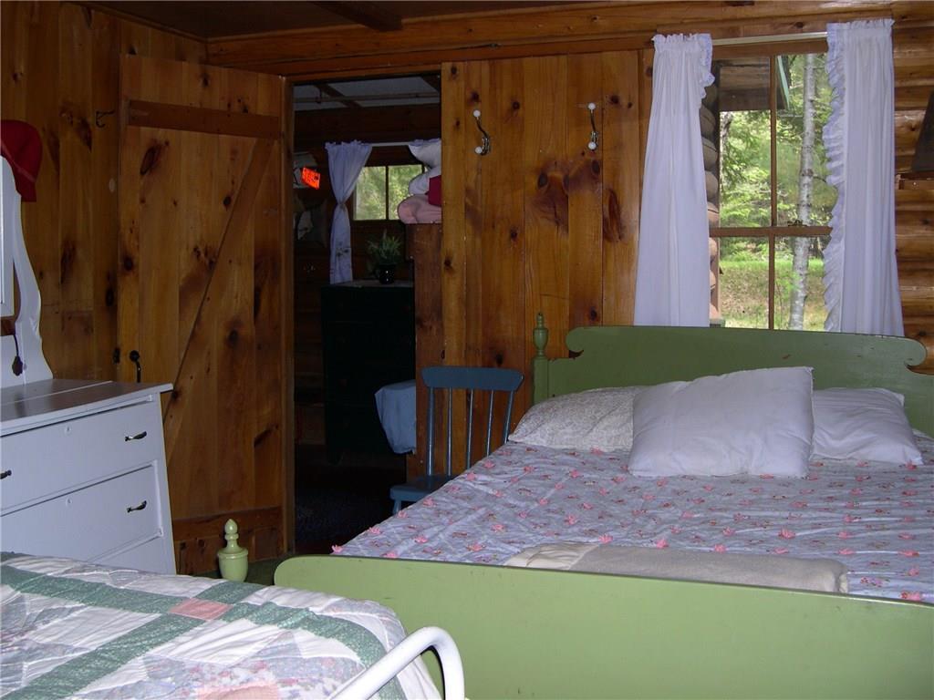 279 Dodge Pond Road, Unit 5 Rangeley, ME 04970 - Photo 14 of 35 guest room looking into bunk room