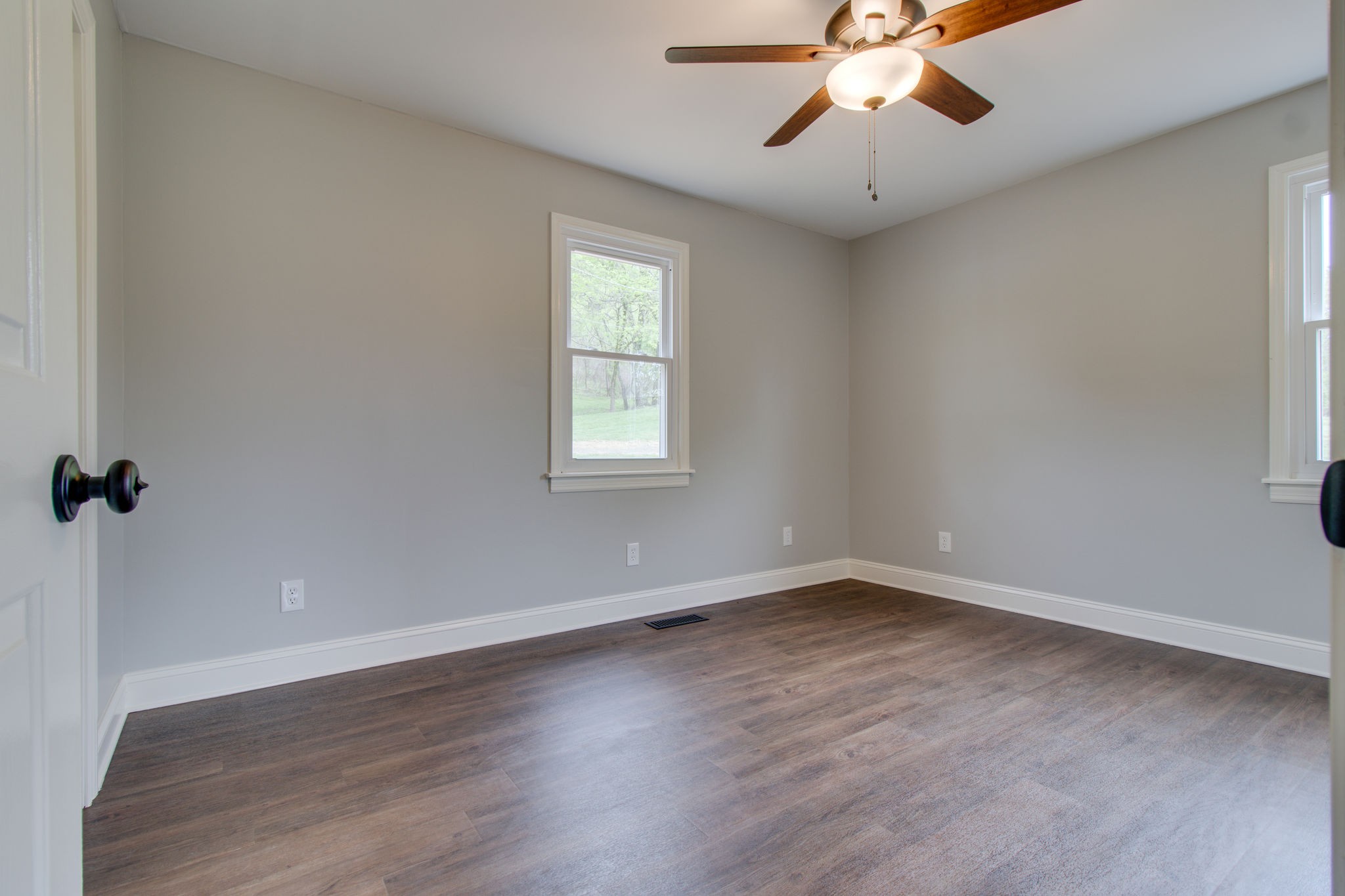 3990 Fairview Road Columbia, TN 38401 - Photo 25 of 29 wooden floor in an empty room with a window