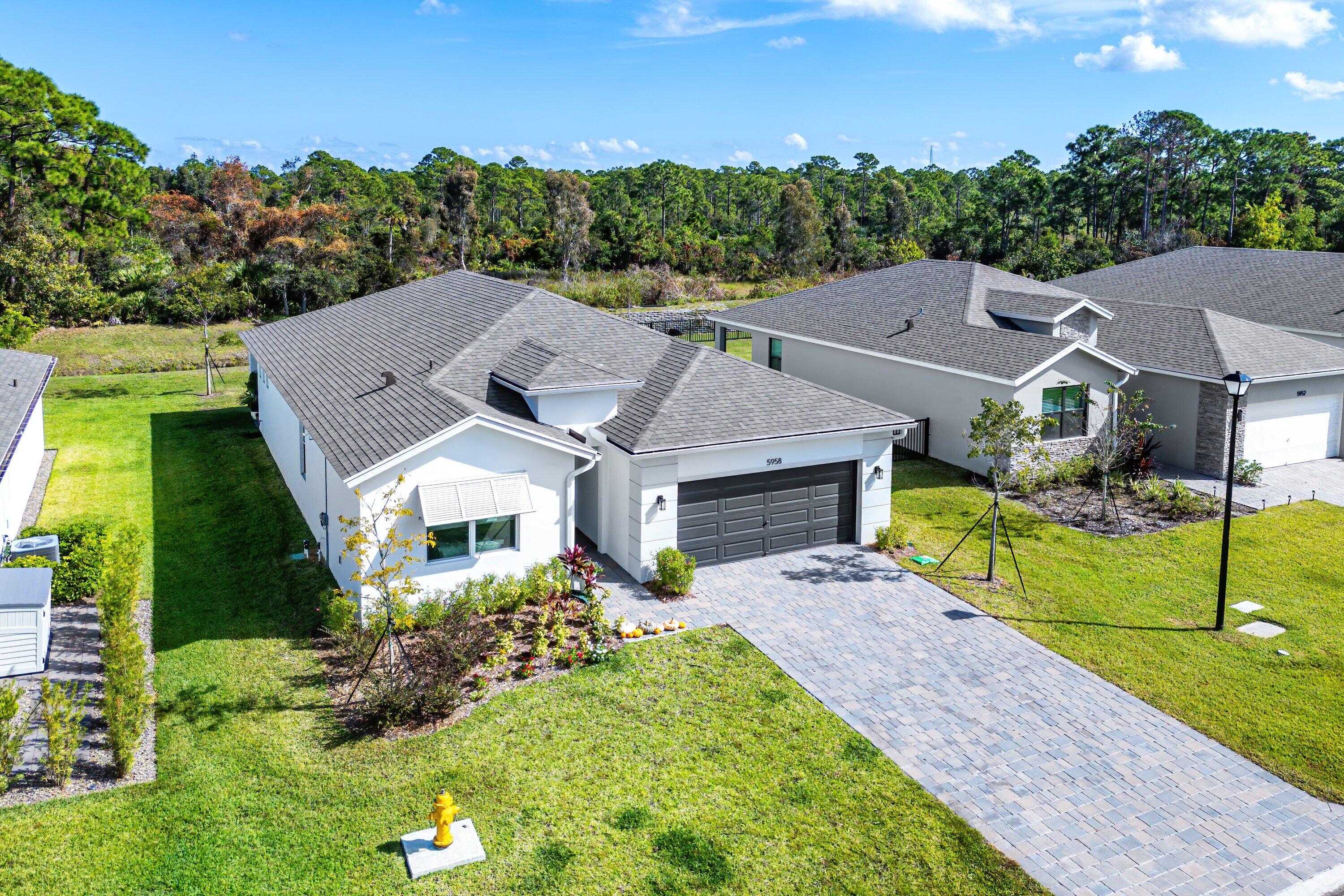 5958 Southeast Sky Blue Circle Stuart, FL 34997 - Photo 1 of 49 Front