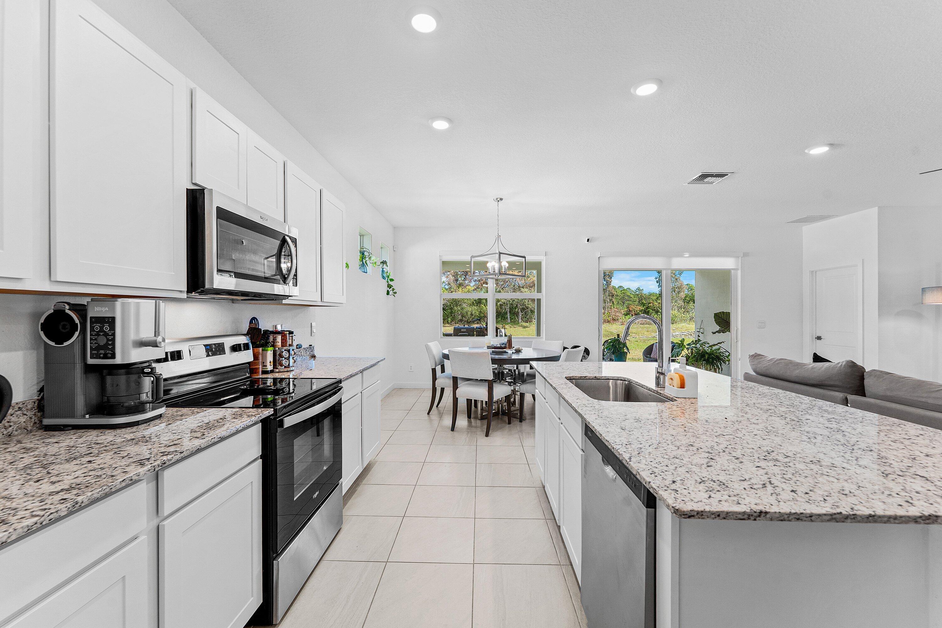 5958 Southeast Sky Blue Circle Stuart, FL 34997 - Photo 11 of 49 Kitchen / Dining Room
