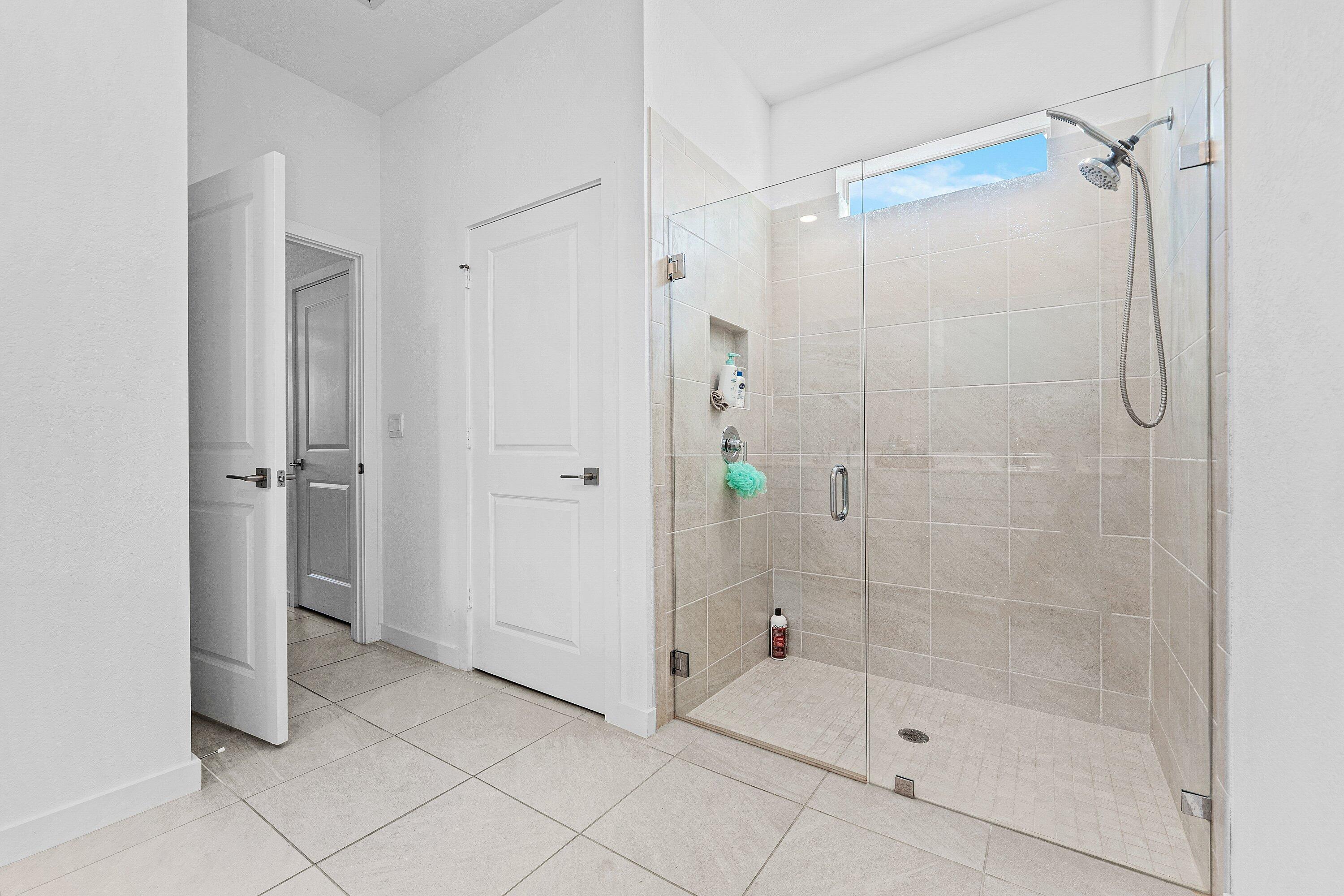 5958 Southeast Sky Blue Circle Stuart, FL 34997 - Photo 22 of 49 Primary Ensuite Bathroom