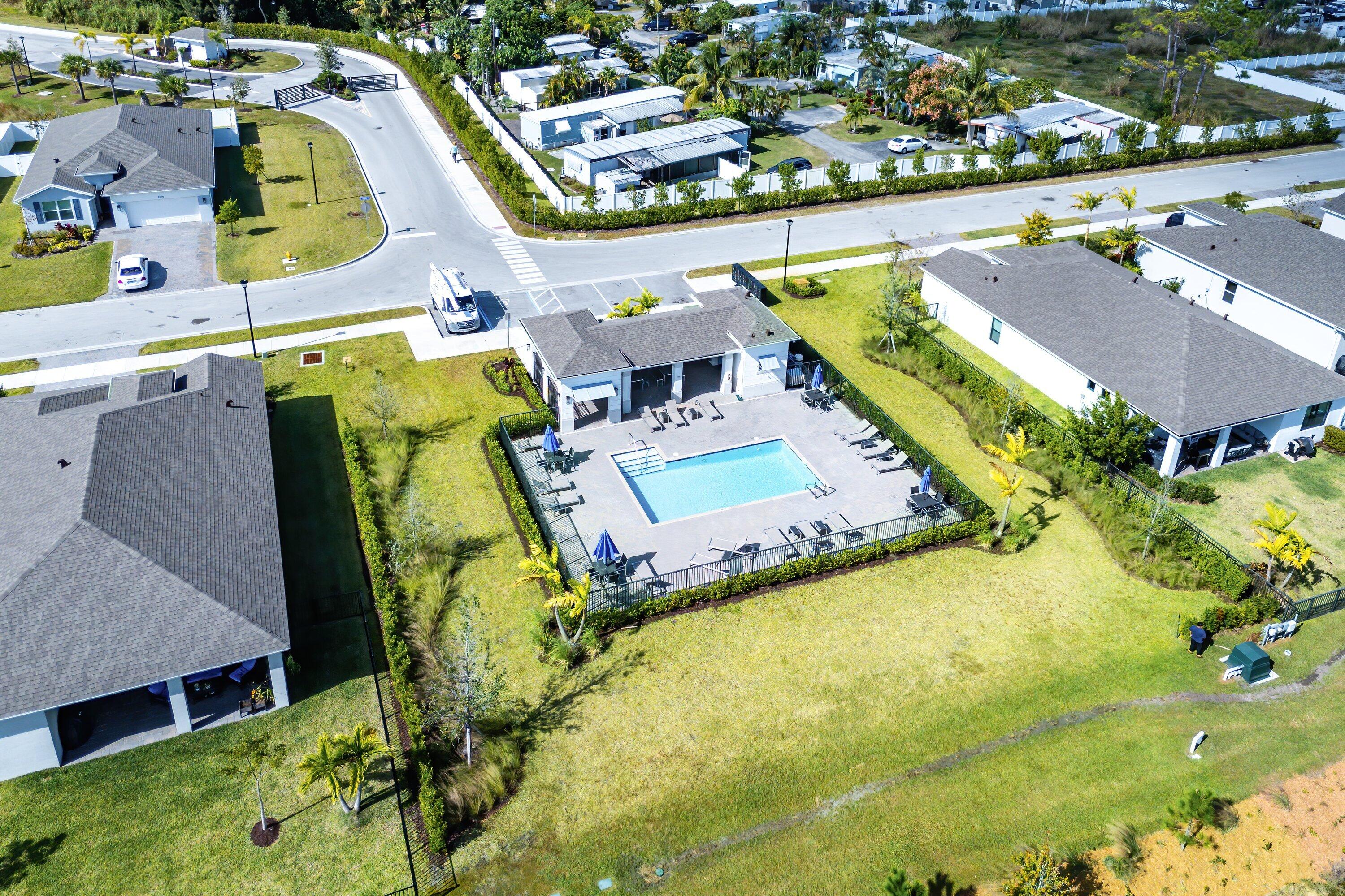5958 Southeast Sky Blue Circle Stuart, FL 34997 - Photo 47 of 49 Aerial of community pool