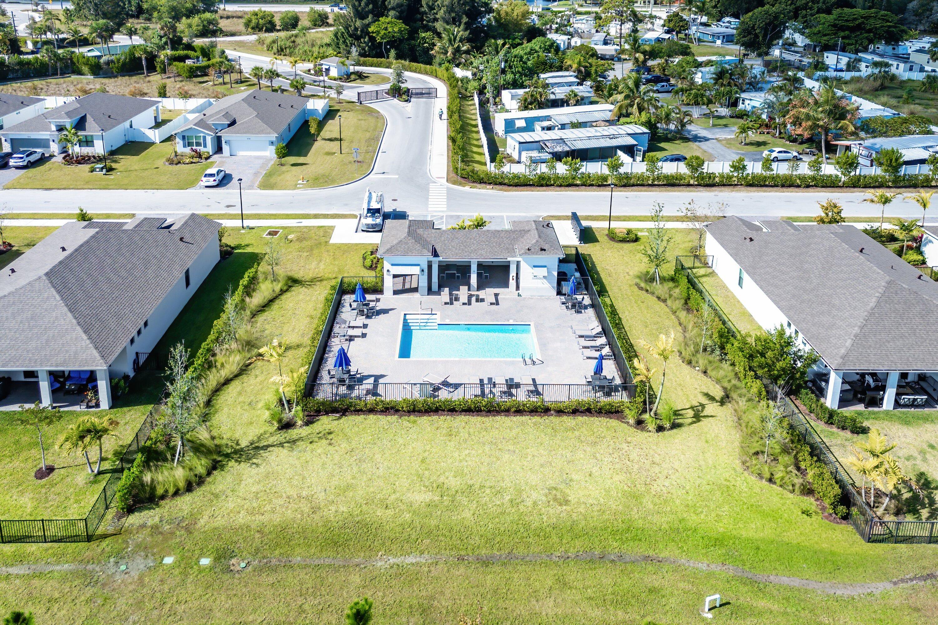 5958 Southeast Sky Blue Circle Stuart, FL 34997 - Photo 48 of 49 Aerial of community pool