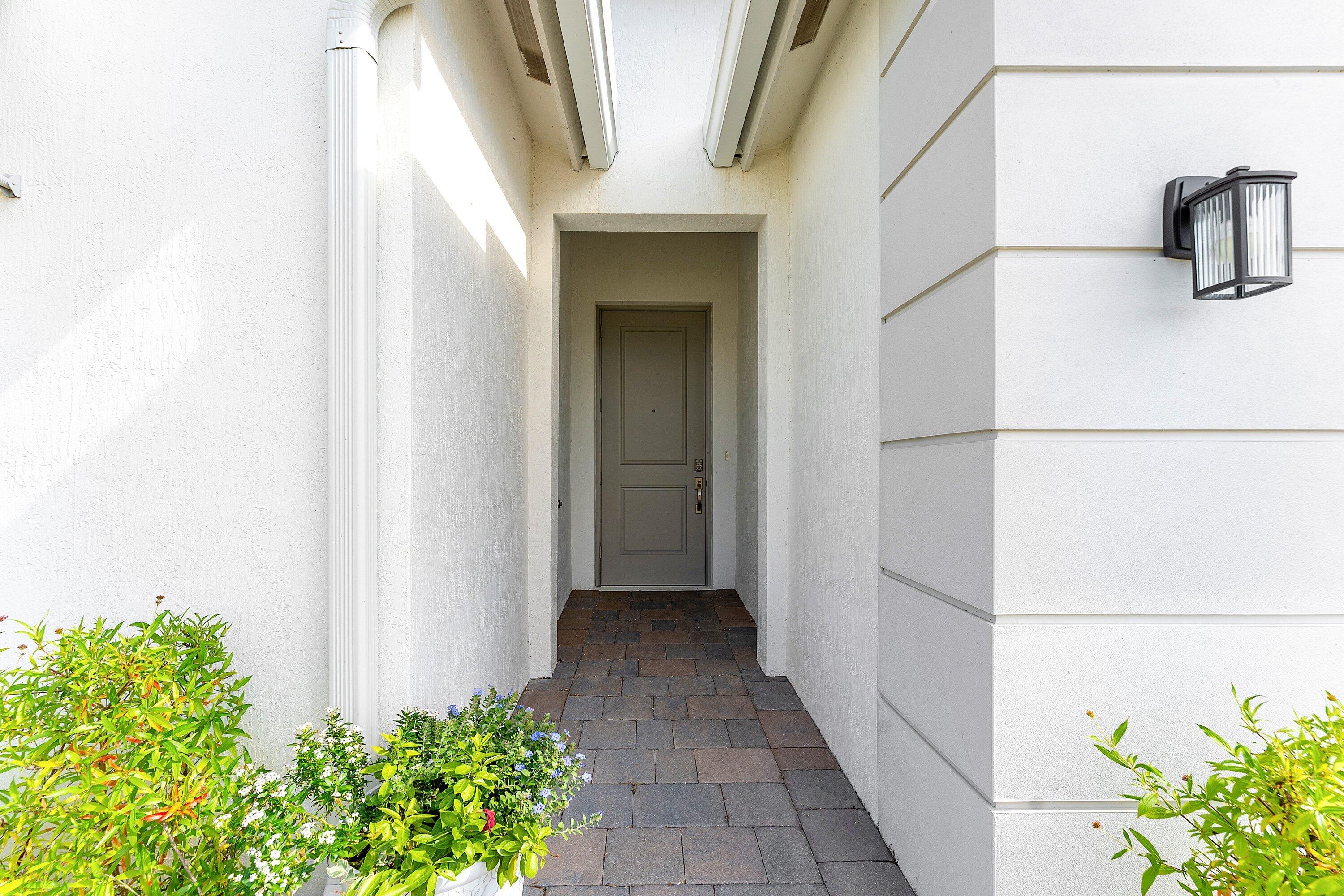 5958 Southeast Sky Blue Circle Stuart, FL 34997 - Photo 5 of 49 Front Walkway