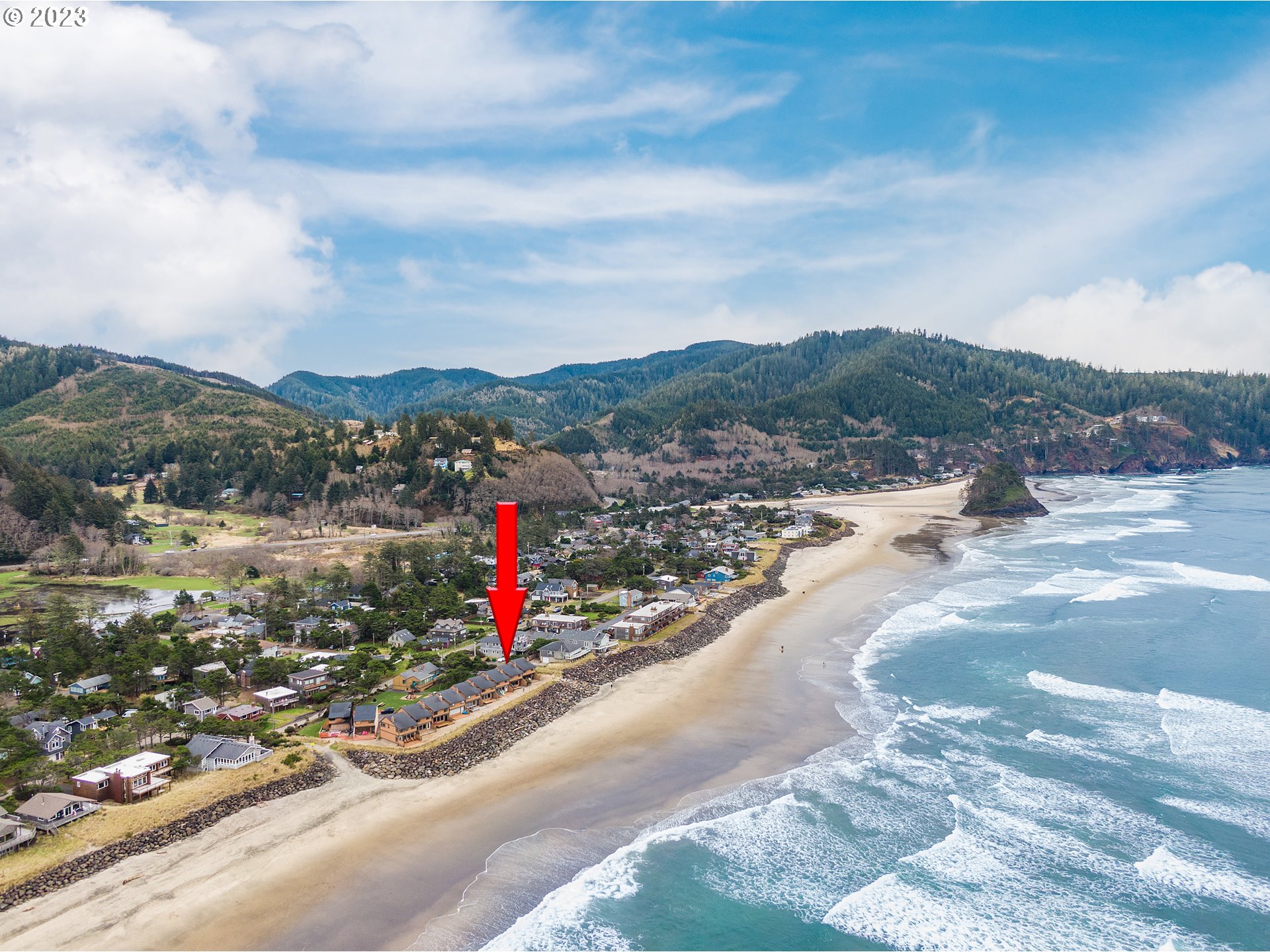 48060 Breakers Boulevard, Unit 2 Neskowin, OR 97149 - Photo 26 of 26 a view of a street with a mountain