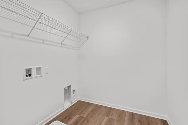 a view of a room with racks on the wall