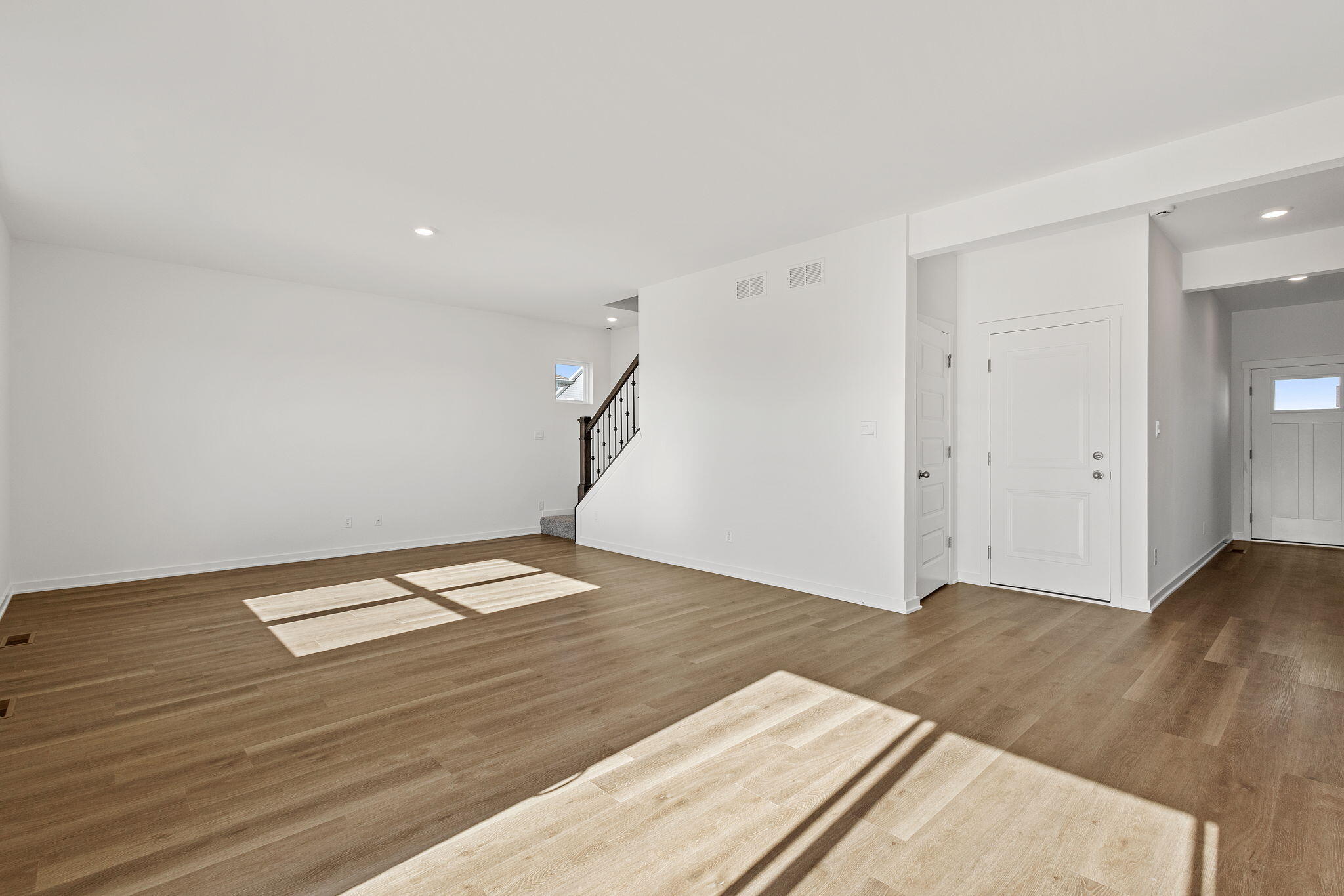 7770 West 106th Lane Crown Point, IN 46307 - Photo 7 of 25 a view of a livingroom with an empty space