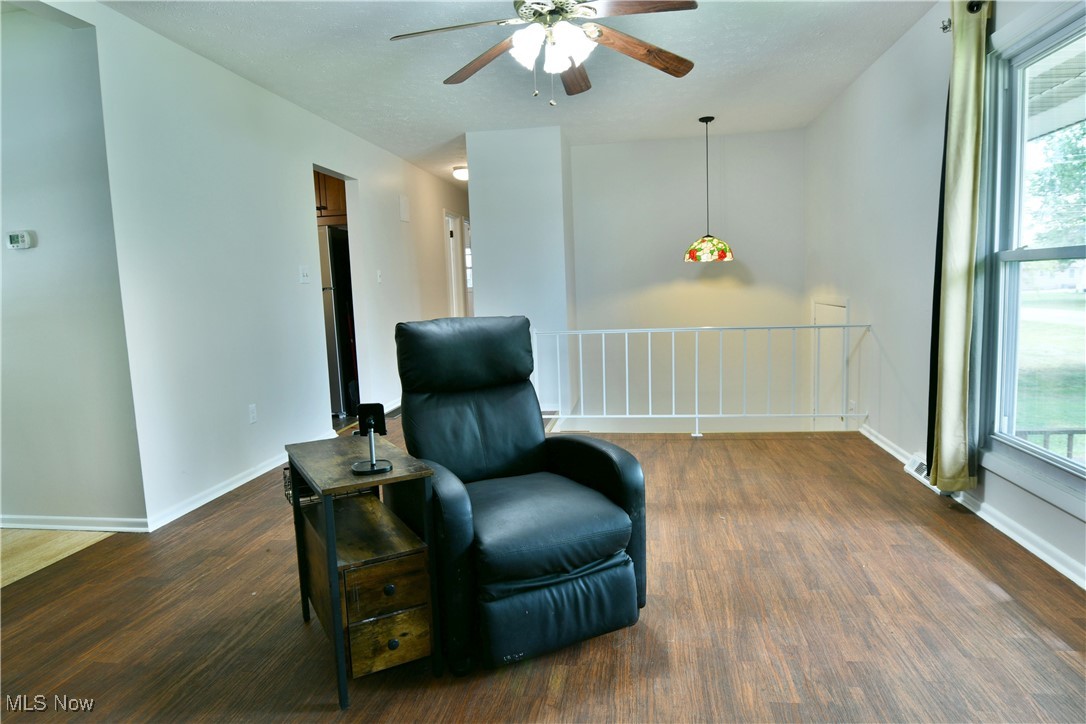 234 Howland Wilson Road Northeast Warren, OH 44484 - Photo 7 of 37 Sitting room featuring a ceiling fan and wood finished floors