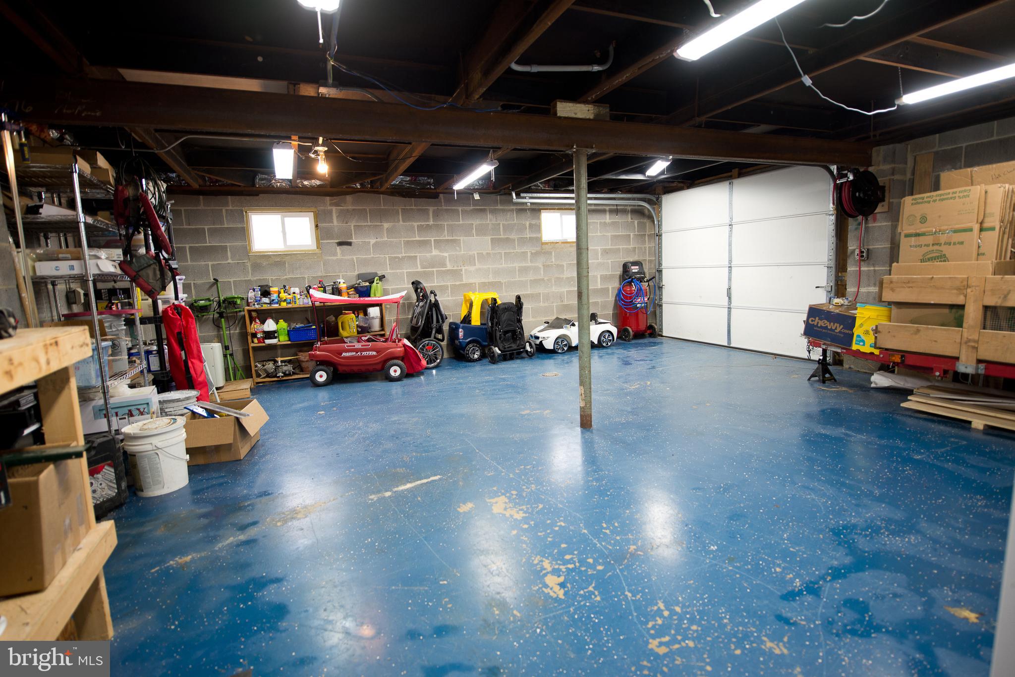 22261 Point Lookout Road Leonardtown, MD 20650 - Photo 26 of 33 Oversized Garage with workbench