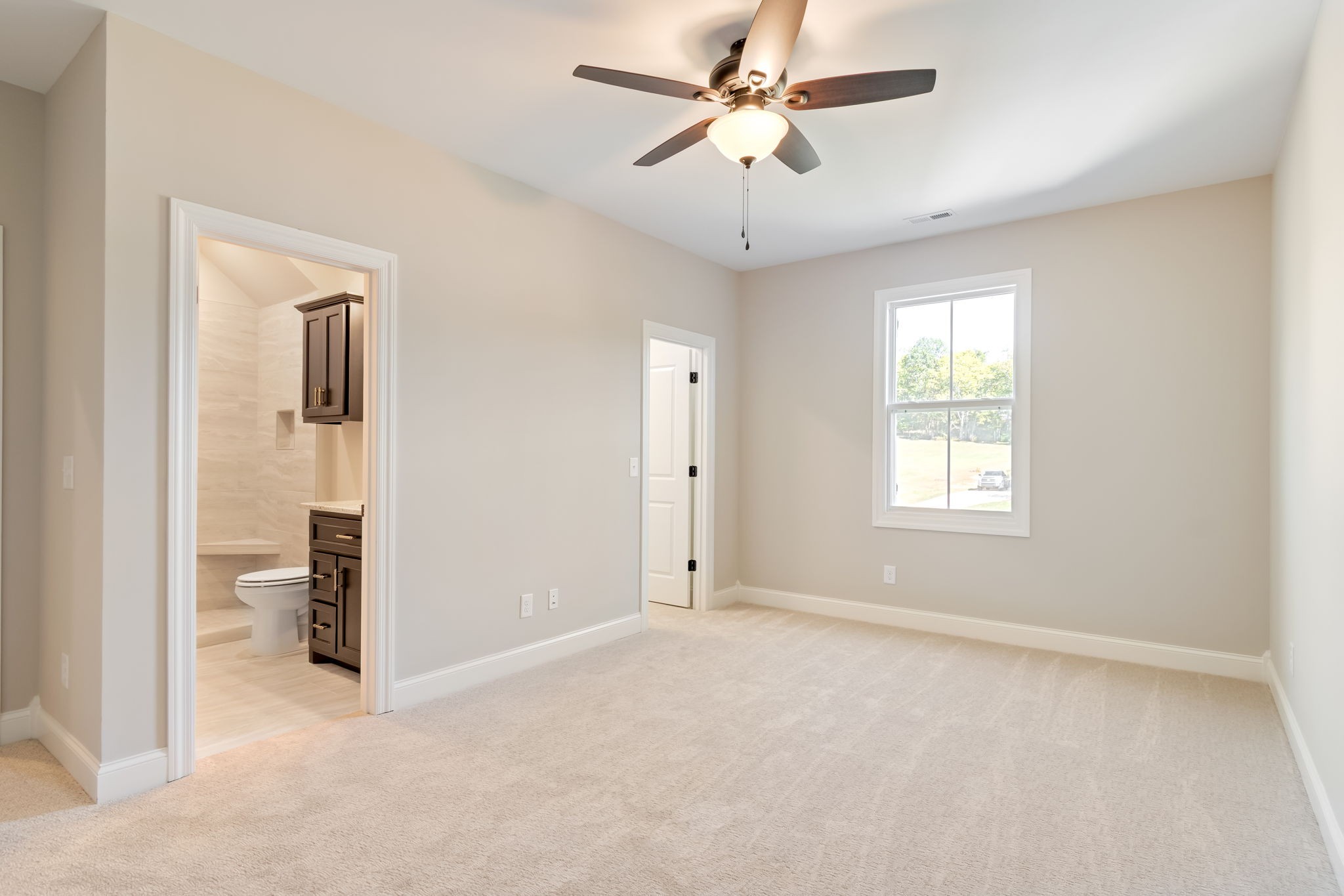 4111 Affiant Way Culleoka, TN 38451 - Photo 21 of 25 an empty room with chandelier fan and windows