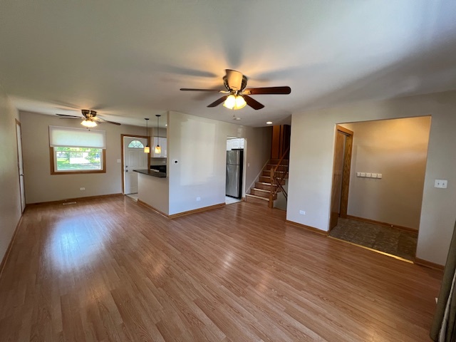 508 Creighton Lane Schaumburg, IL 60193 - Photo 16 of 22 a view of an empty room with window and wooden floor