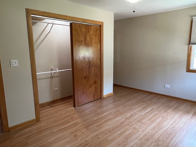 508 Creighton Lane Schaumburg, IL 60193 - Photo 18 of 22 a view of an empty room with wooden floor and a window