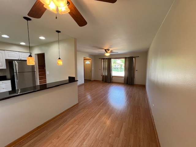508 Creighton Lane Schaumburg, IL 60193 - Photo 7 of 22 a view of a hallway with wooden floor