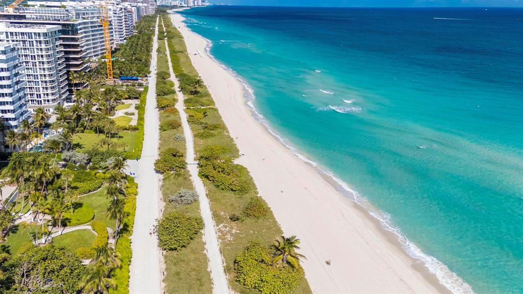 8855 Collins Avenue, Unit 2D Surfside, FL 33154 - Photo 20 of 25 a view of swimming pool from a balcony