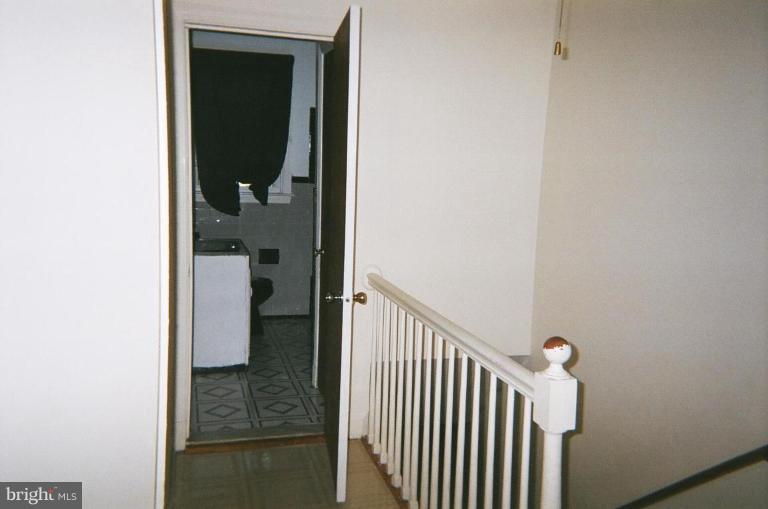 443 South Wickham Road Baltimore, MD 21229 - Photo 8 of 9 a view of a bathroom from a hallway