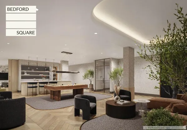 a kitchen with a table and chairs