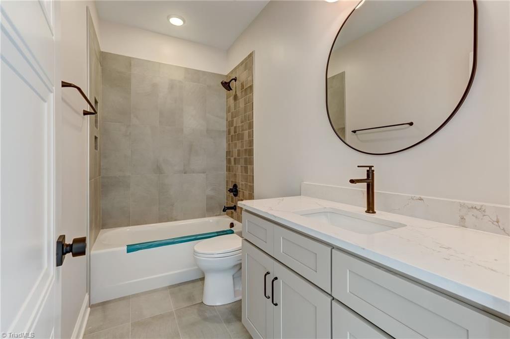 7688 Kyran Court Oak Ridge, NC 27310 - Photo 29 of 40 En suite bath for 4th bedroom