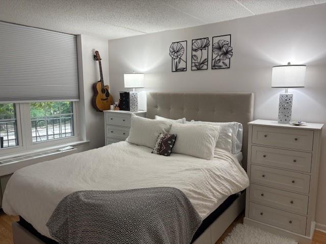 9971 Shore Road, Unit 9C Brooklyn, NY 11209 - Photo 6 of 9 a bedroom with a bed and a window