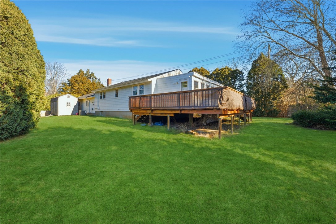 382 Beavertail Road Jamestown, RI 02835 - Photo 3 of 31 Enjoy the summer breeze from this private backyard and deck!