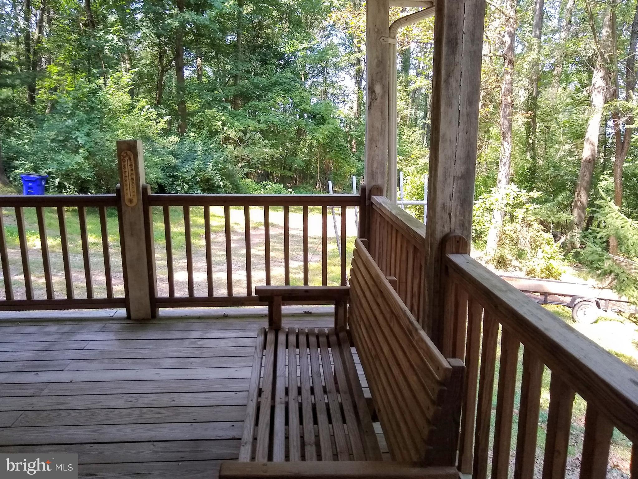 15265 Barnes Road New Windsor, MD 21776 - Photo 18 of 25 Covered Deck with wooded view