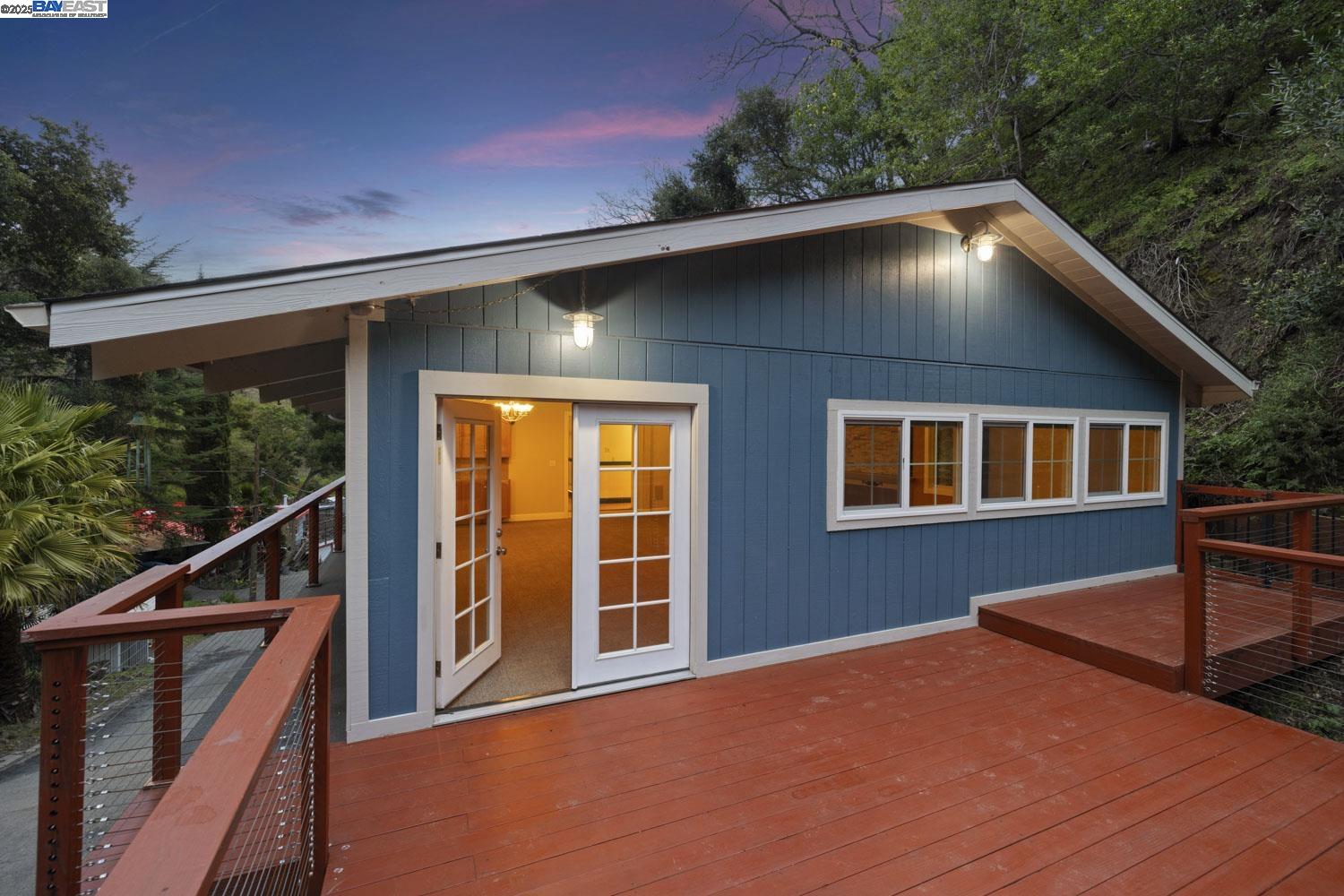 a house with trees in the background