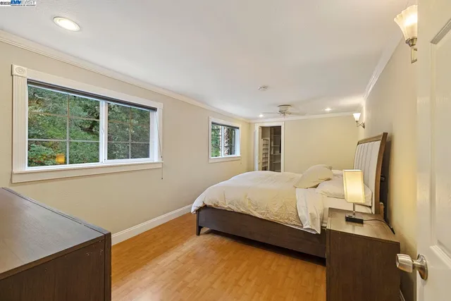 a room with a bed and a window