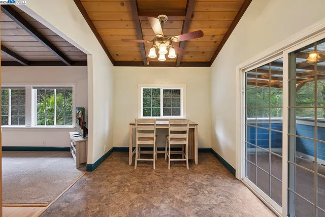 a view of a livingroom with furniture and window