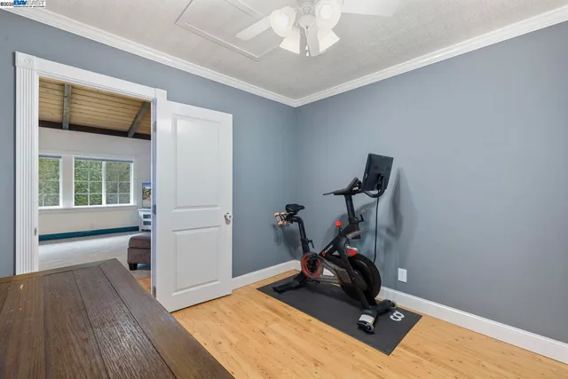 a spacious bathroom with a granite countertop sink toilet and shower