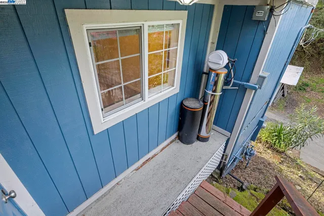 a view of a swimming pool with a yard