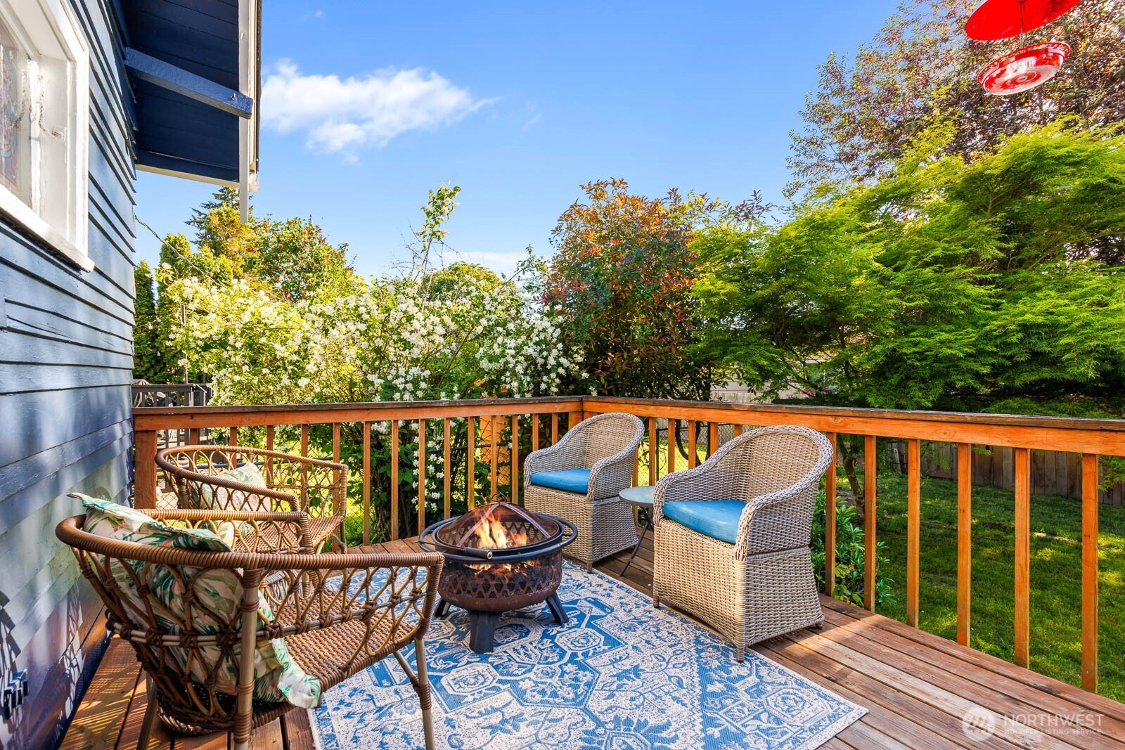 1002 South Adams Street Tacoma, WA 98405 - Photo 32 of 40 a view of balcony with wooden floor and outdoor seating