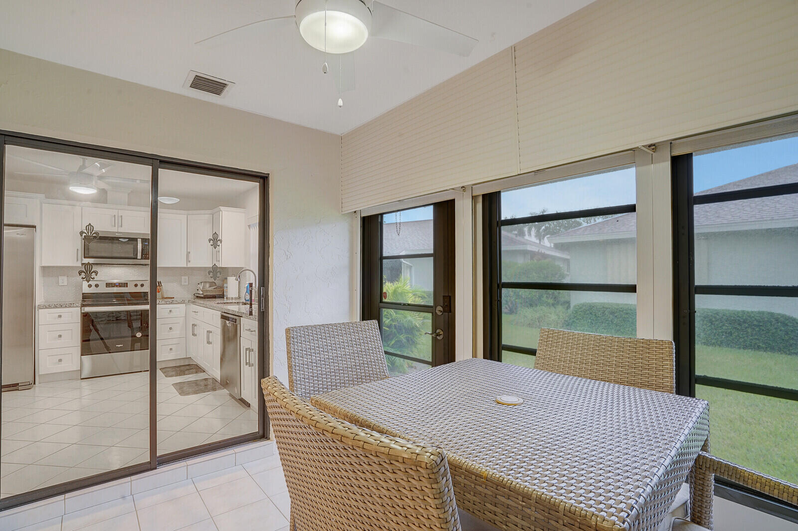 4180 Mango Tree Court, Unit B Boynton Beach, FL 33436 - Photo 15 of 25 a room with pool table and windows