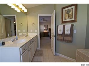 208 Sand Paver Way Fort Mill, SC 29708 - Photo 11 of 16 a bathroom with a double vanity sink and a mirror