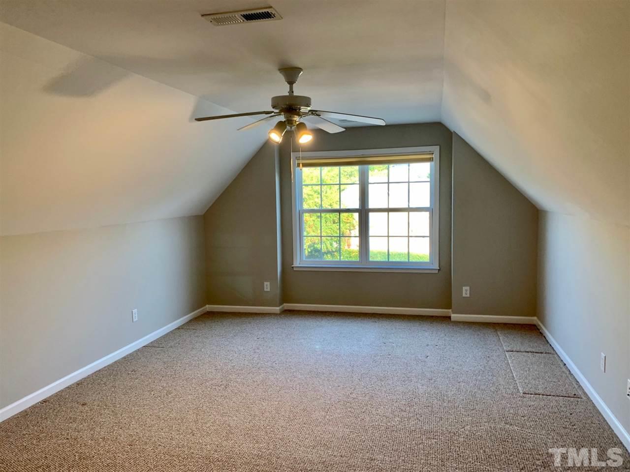 10445 Blue Dun Way Raleigh, NC 27614 - Photo 22 of 28 wooden floor and window in an empty room