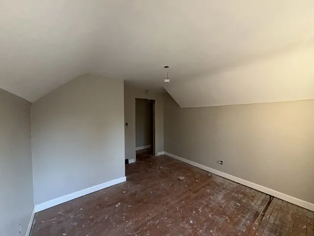 an empty room with an entryway