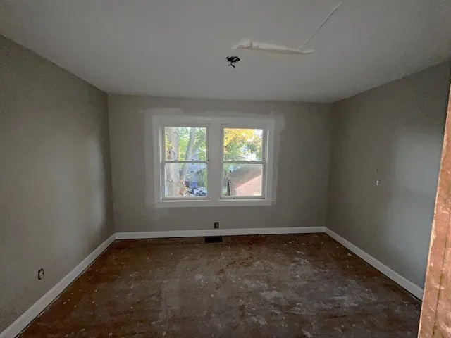 an empty room with a window