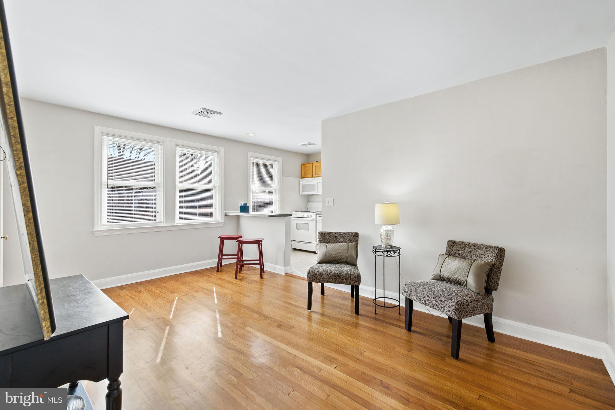 2408 Briarwood Road Baltimore, MD 21209 - Photo 12 of 24 2nd level unit living room/DR combo with hardwood