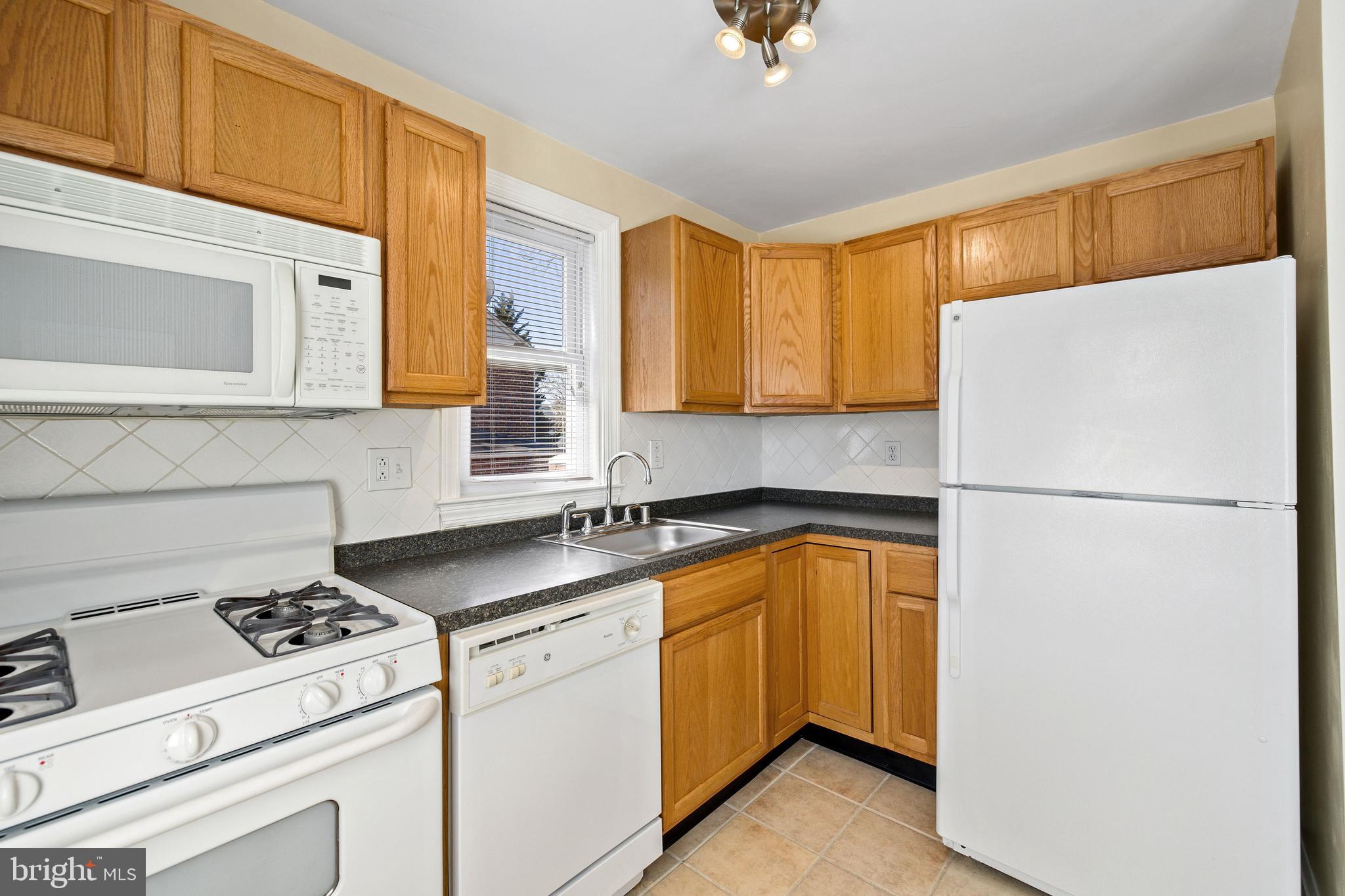 2408 Briarwood Road Baltimore, MD 21209 - Photo 15 of 24 2nd floor Gas cooking in fully equipped kitchen