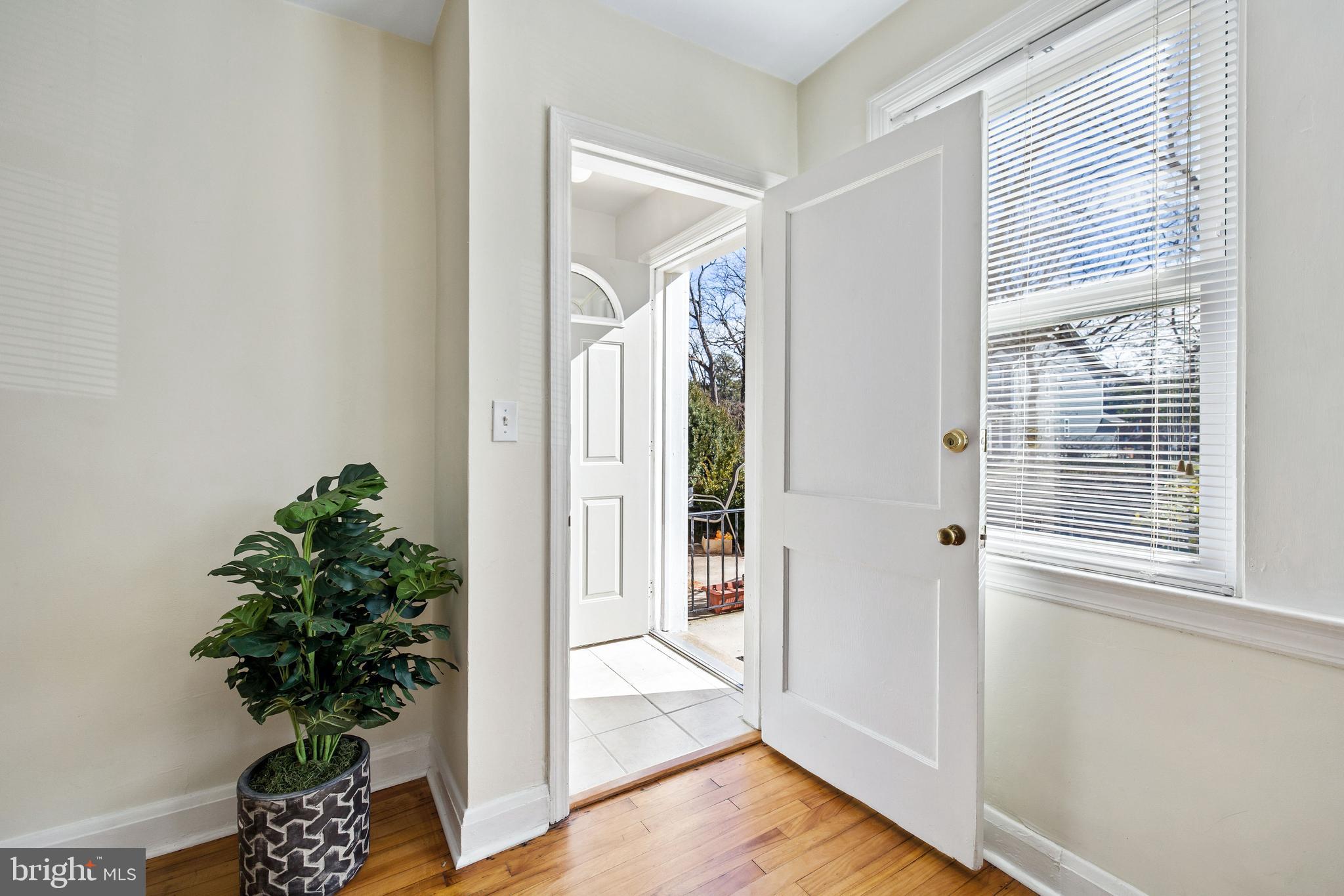 2408 Briarwood Road Baltimore, MD 21209 - Photo 3 of 24 Foyer divided the 2 entrances to each unit