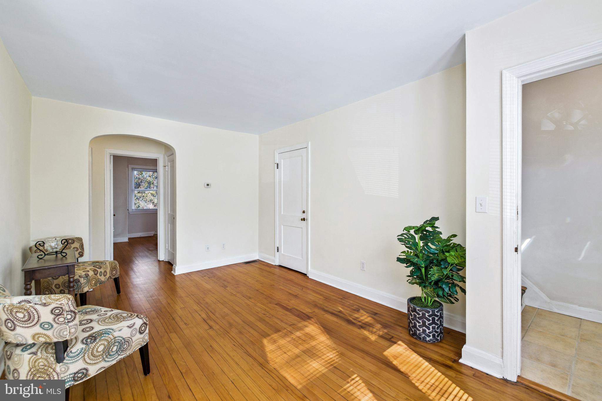 2408 Briarwood Road Baltimore, MD 21209 - Photo 4 of 24 Main level living room with hardwood floors