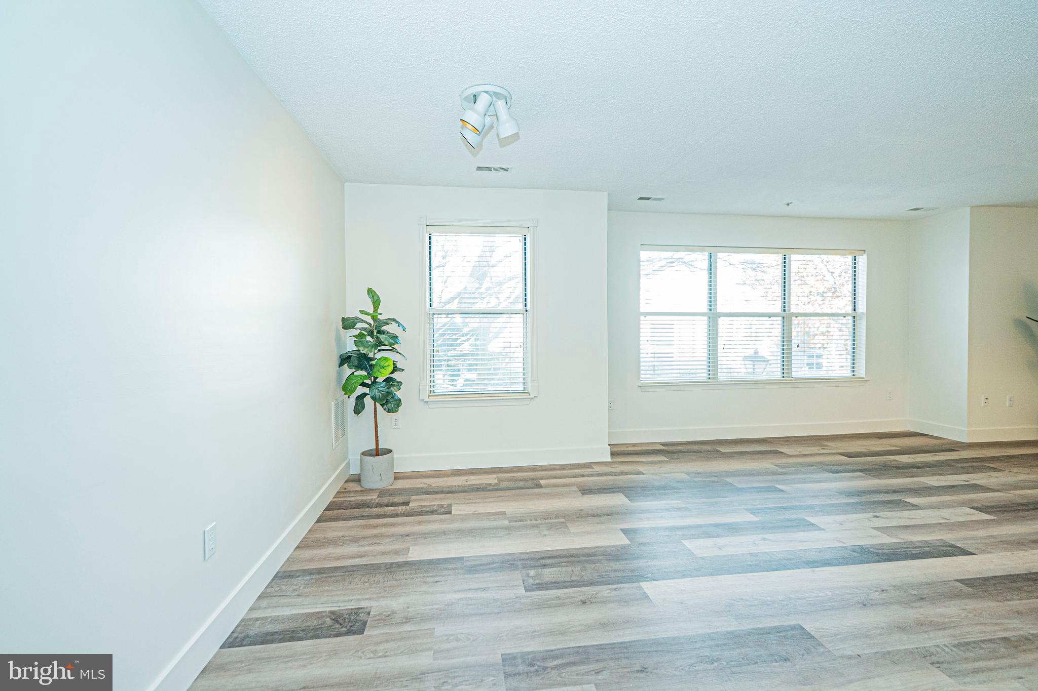 2600 Camelback Lane, Unit 6 Silver Spring, MD 20906 - Photo 8 of 40 a view of an entryway with wooden floor