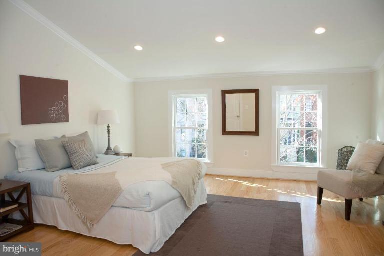 Expansive windows and slanted ceiling.